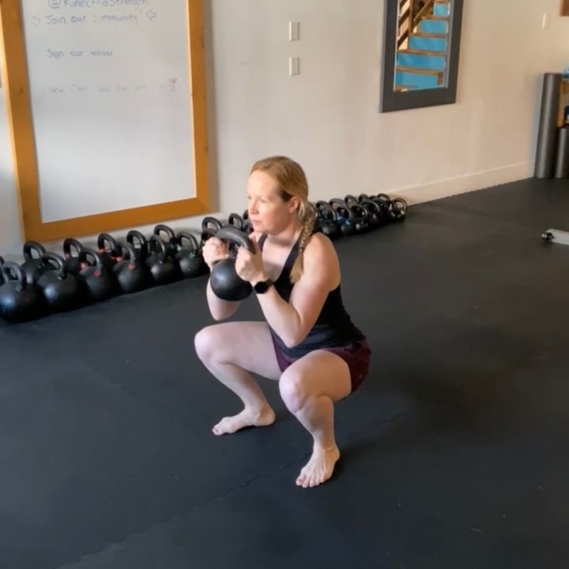 Andrea doing a goblet squat